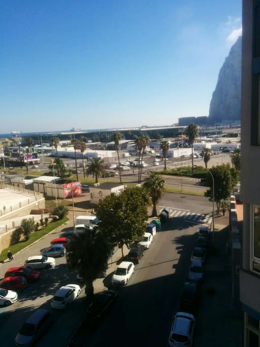 This is the view of the frontier from my window . It's a three minute walk from my building.The airport is the glass building just past the frontier .