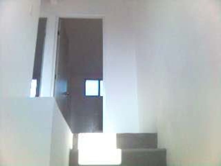 Escaleras a planta alta