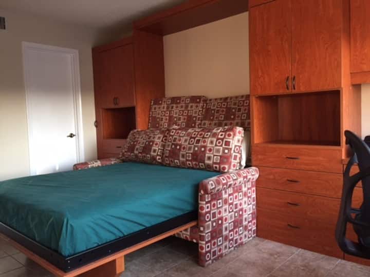 bedroom with murphy bed Queen bed
