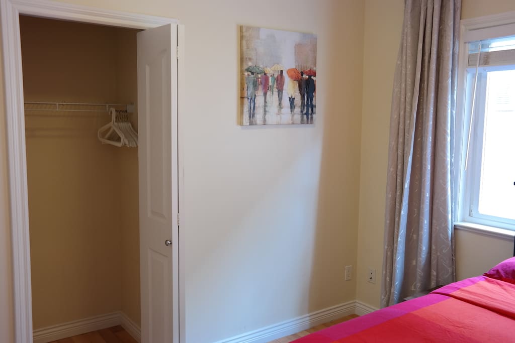 Large closet with ample space to store luggage and plenty of clothes hangers are provided.