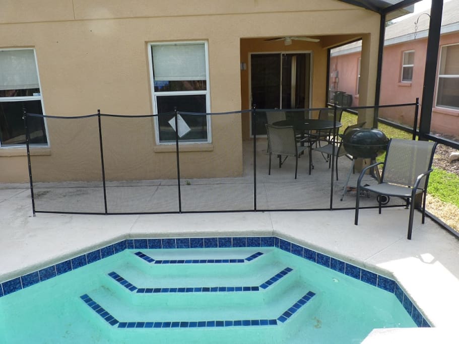 Fenced pool with optional pool heating.