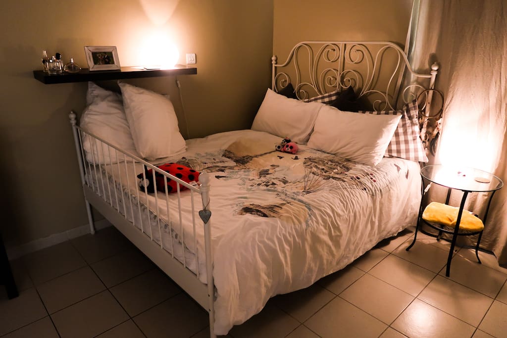 Comfortable double bed with extra pillows