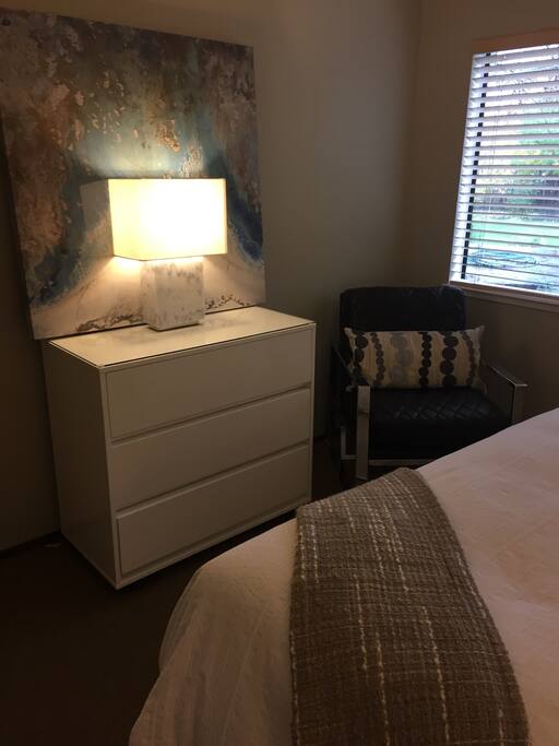 Same bedroom with view of back yard.