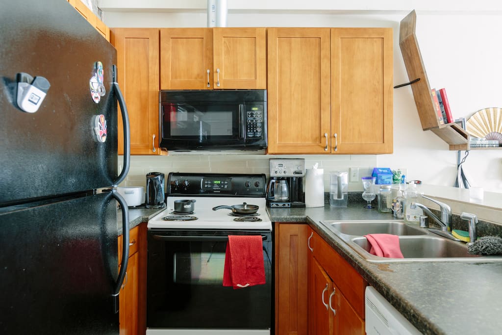 Refrigerator, microwave, stove, and oven.