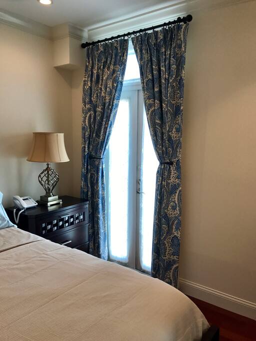 French doors in the bedroom lead to a small iron balconette, which, while lovely to view, is not accessible to our guests, for safety reasons.