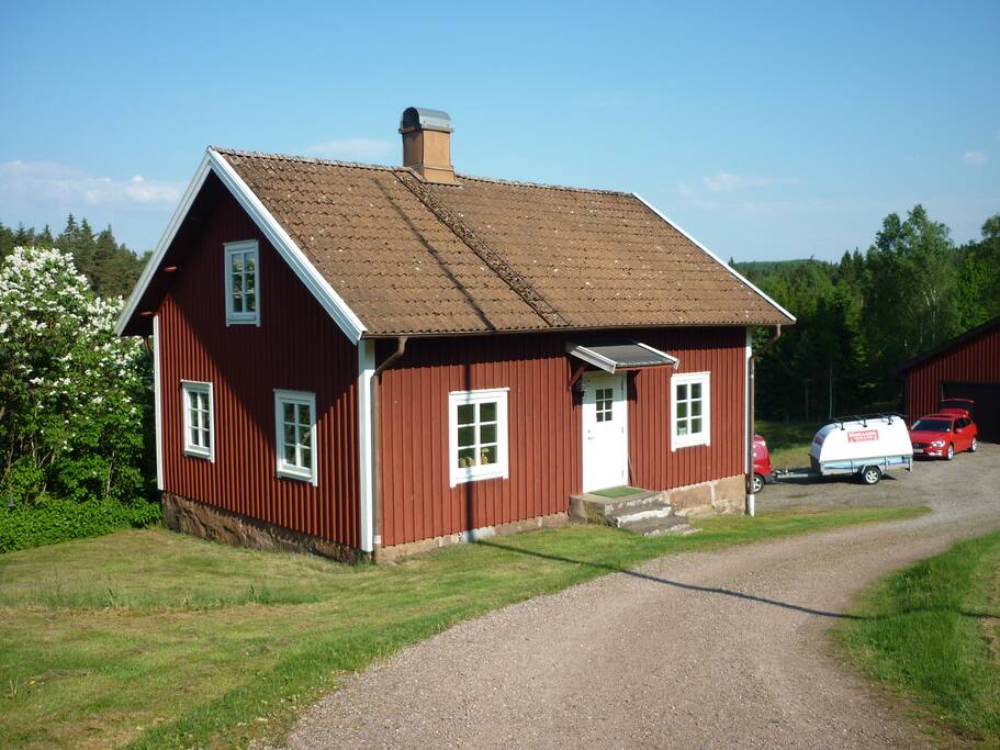 The house seen from southeast. Parking seen in the background.