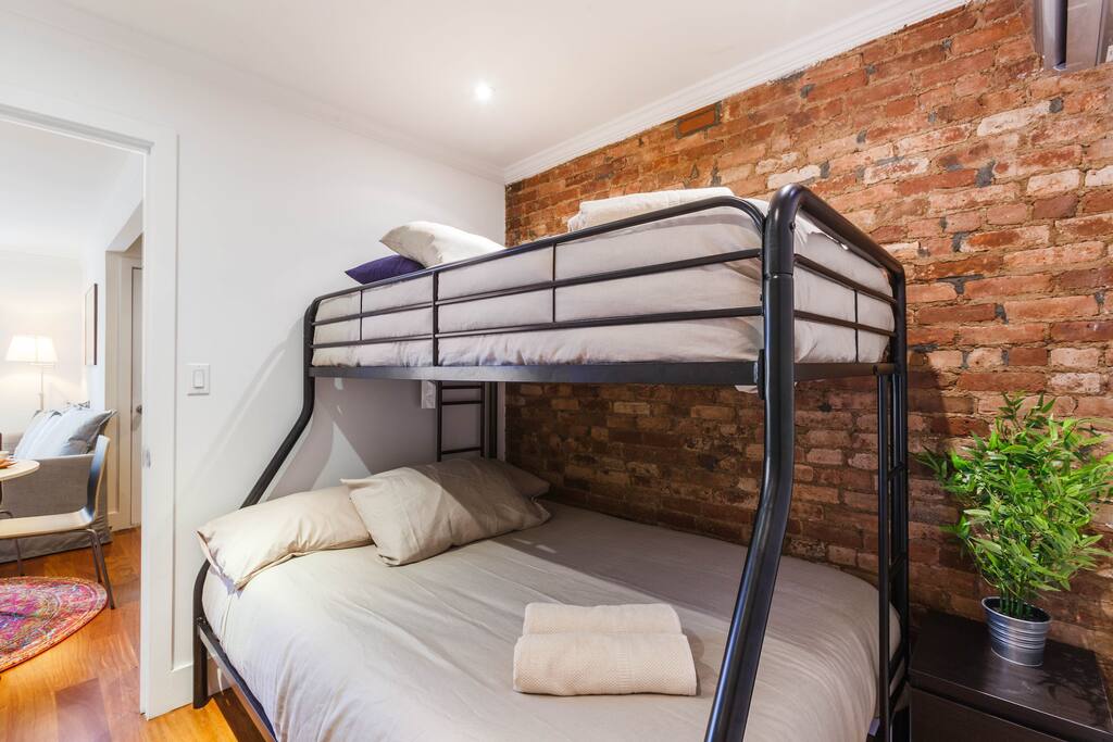 One bunk bed set helps to make this apartment great for large groups.