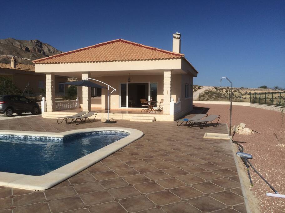 front view with our pool and outside shower