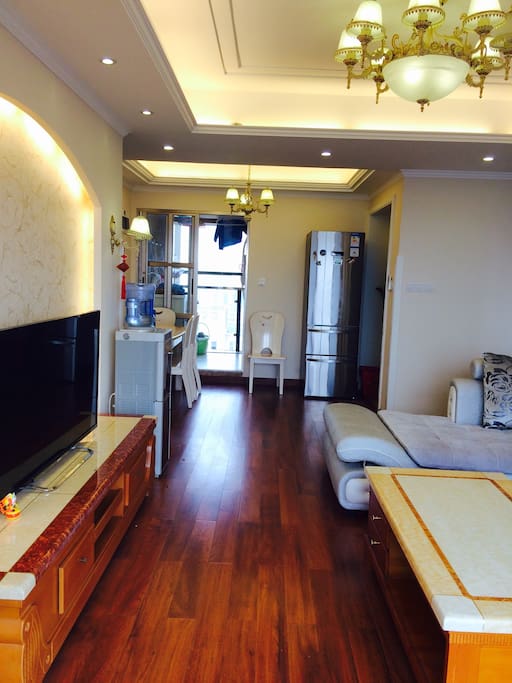 living room with TV, drinking water machine, air conditioner , table and so on