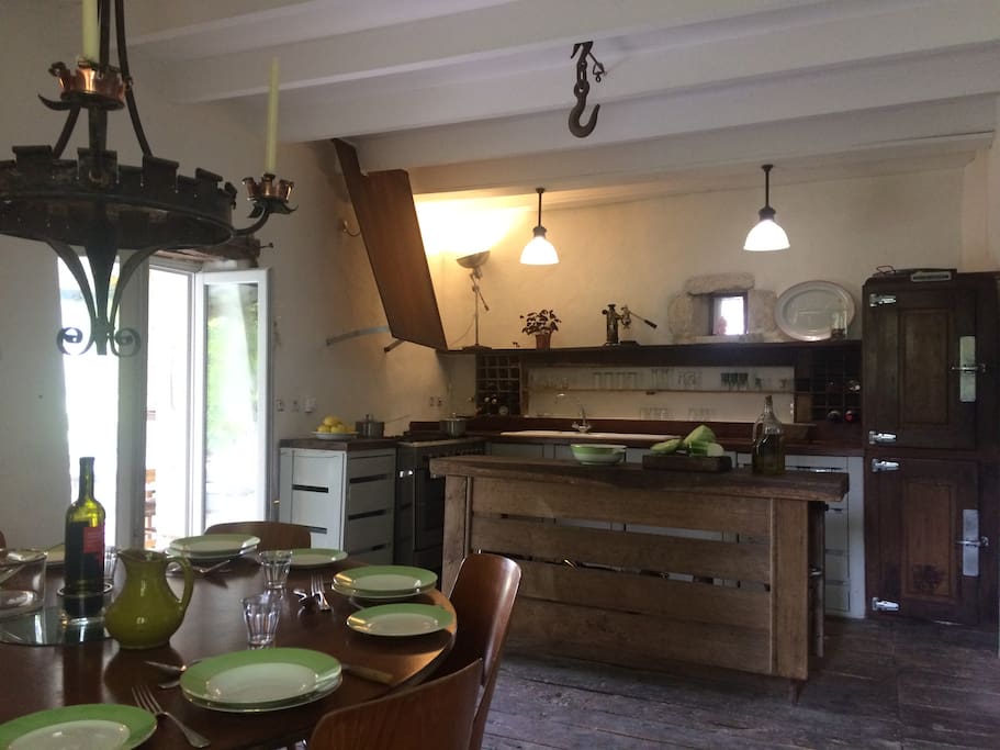 Kitchen / dining room in the main house which includes fridge/freezer, washing machine, dish washer and all the necessary appliances. Five burner gas hob and huge oven.