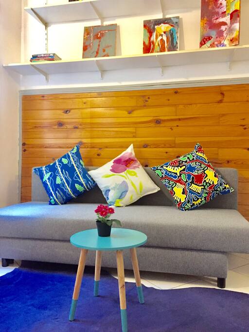 Living space with a sofa can pull out as a double bed for 2 person