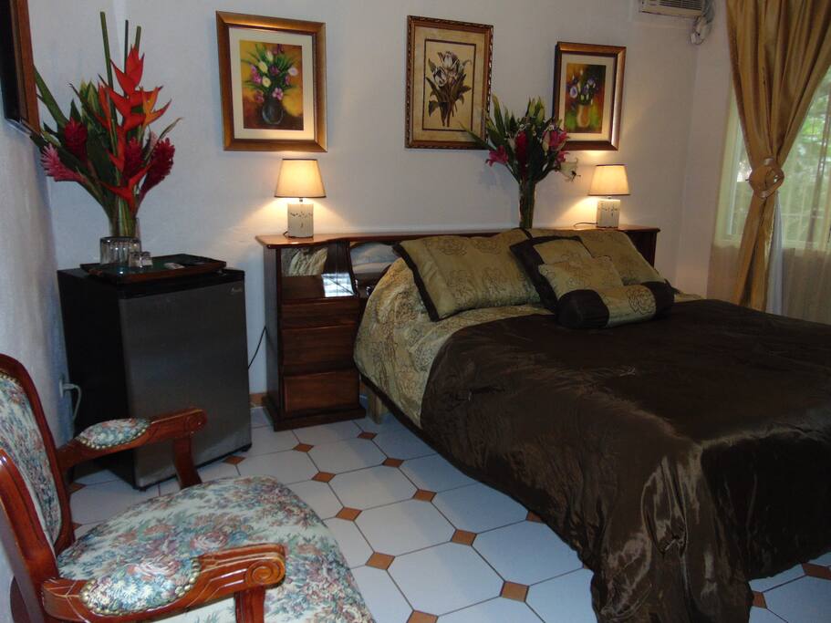 Executive Room #15 has a queen size bed