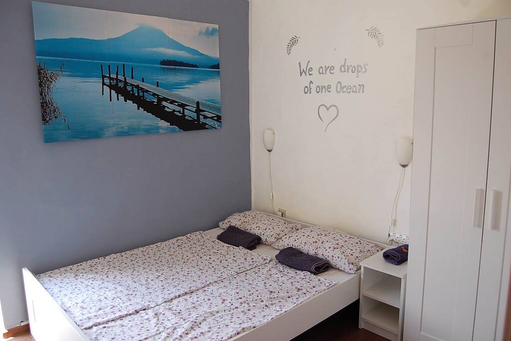 Cosy double-bedroom with AC, wifi, wardrobe and a mini balcony.