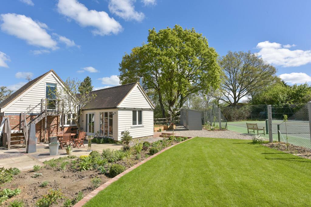 View from main house garden across to patio.