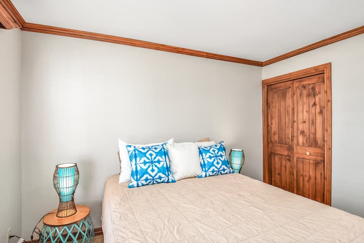 Guest room #1 located on the main floor of the main home. One queen-size bed. The bathroom is in the hallway to the right of this bedroom. The bedroom is completely private and the bathroom can be accessed from the adjacent hallway.
