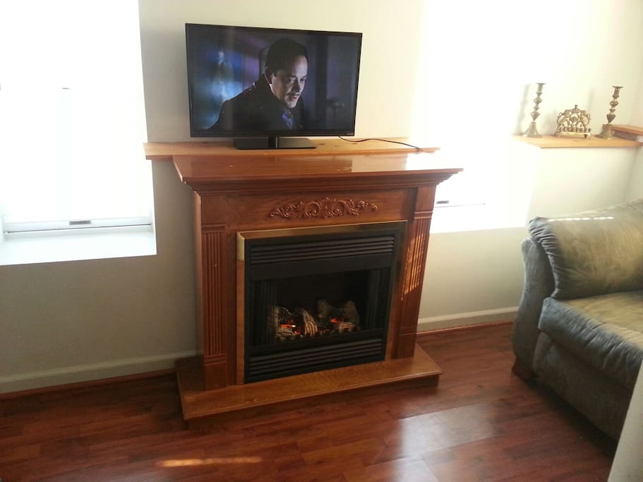 Cozy electric fireplace to warm you.