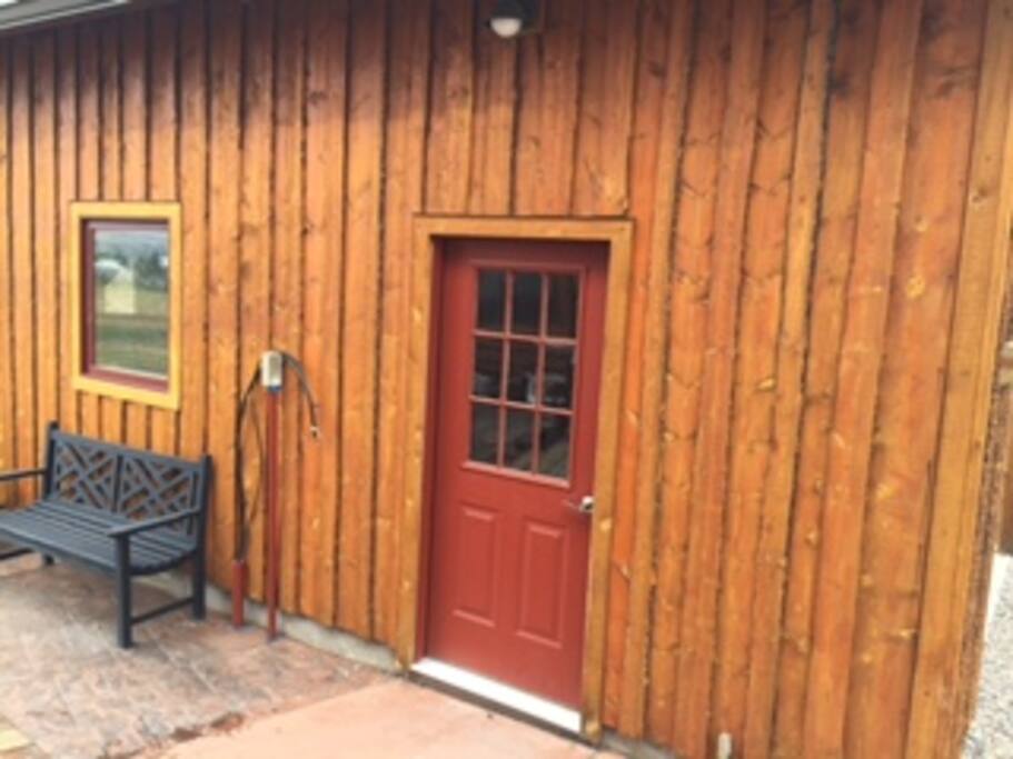 This is the actual door through which you will enter to access the living space. It will be open for you.