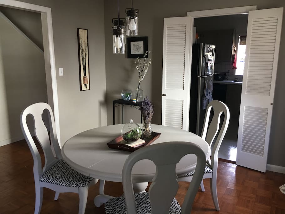 Dining room. Additional chairs are available in closet.