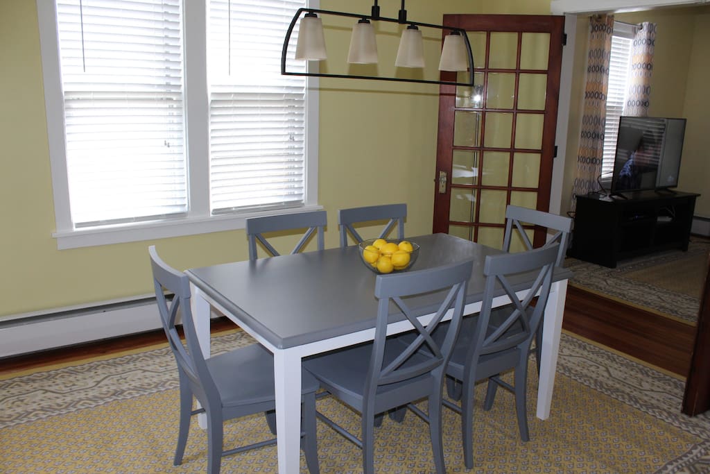 Spacious dining room with seating for six and convenient coffee station