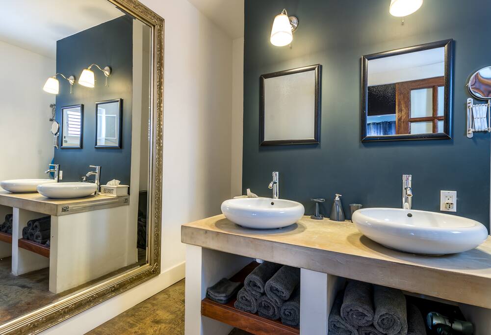 Roomy bath room, rain shower and toilet
