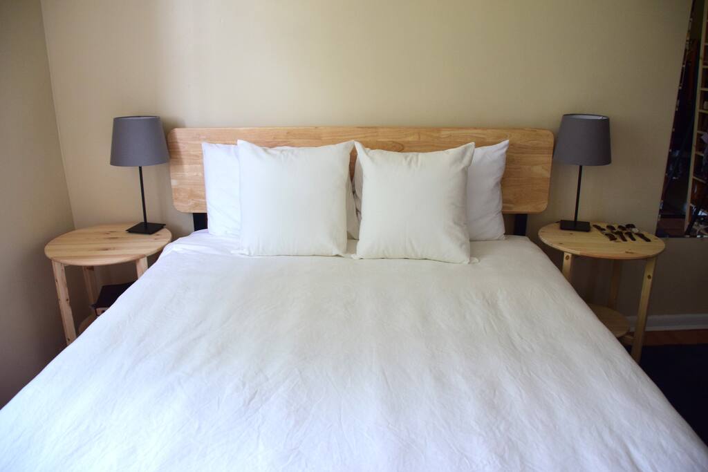 Queen size bed with 3" memory foam mattress topper
