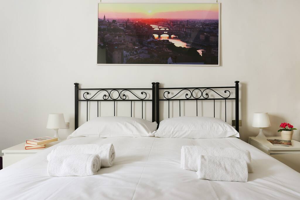 The Bedroom - The comfortable double bed with soft bed-linen and towels