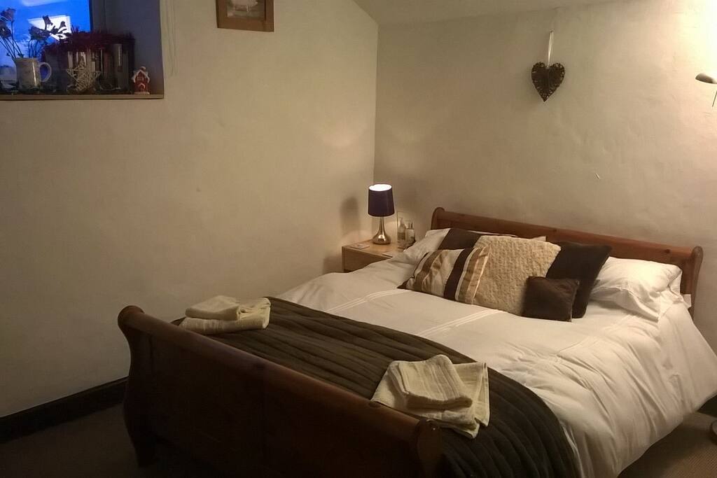 Comfortable double bed ready for guests