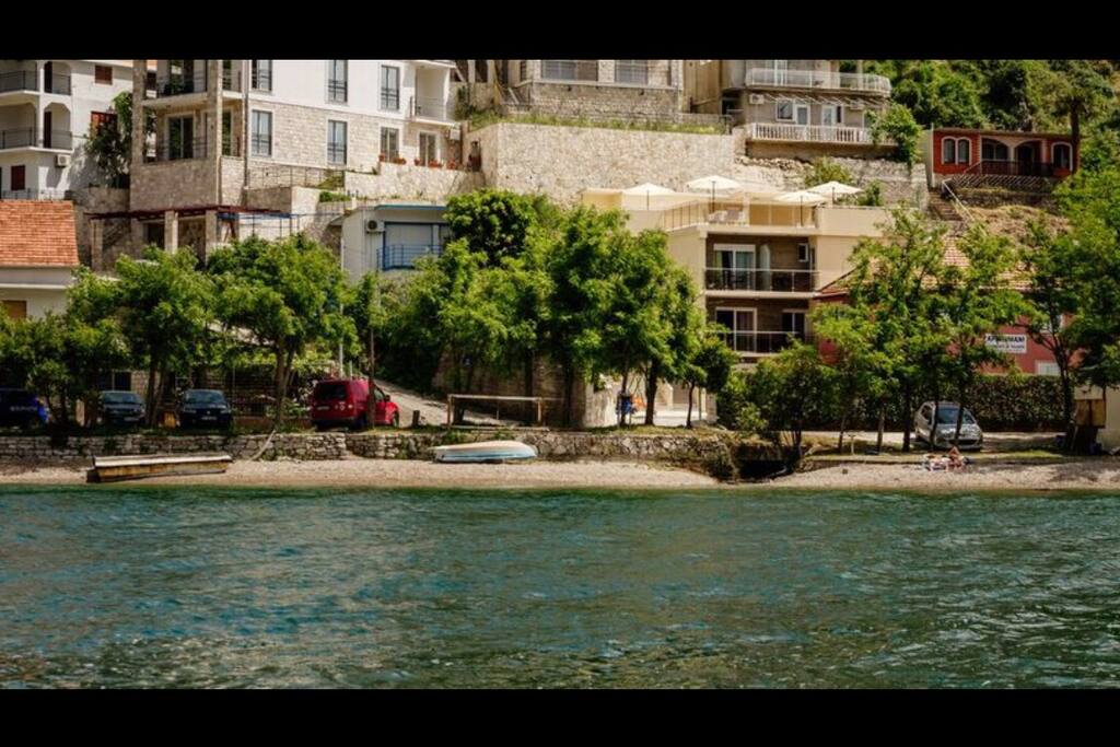 The view on the apartment building from the sea