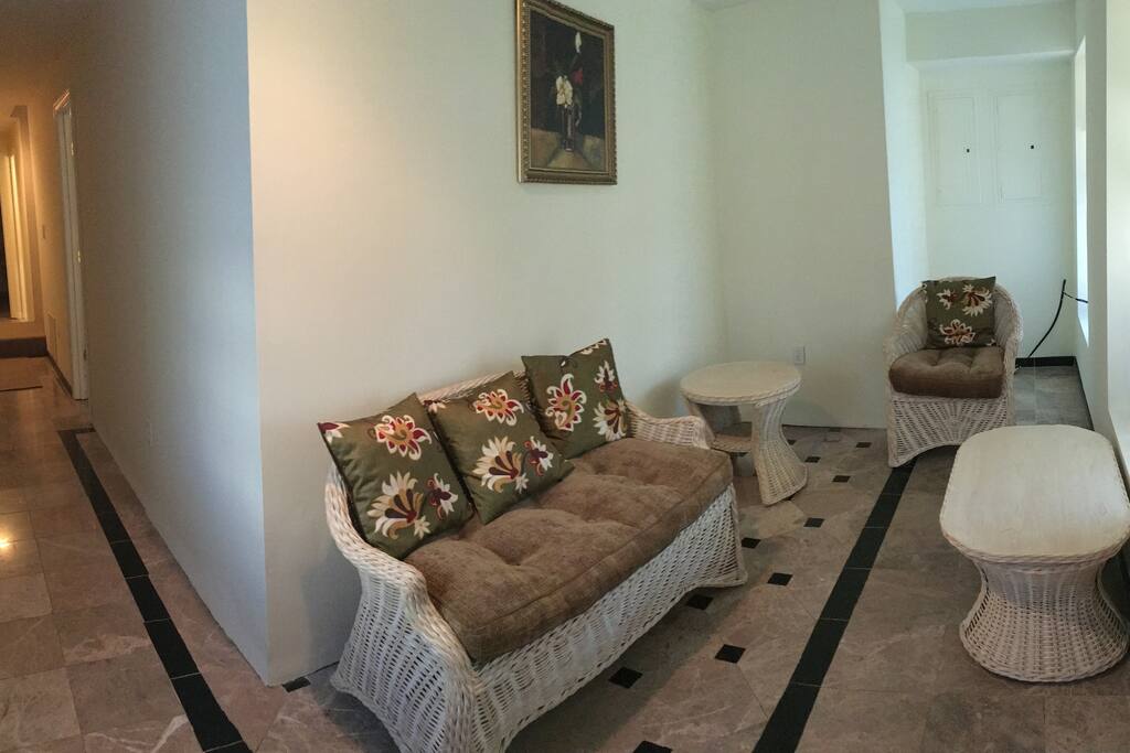 Foyer sitting room in entrance.