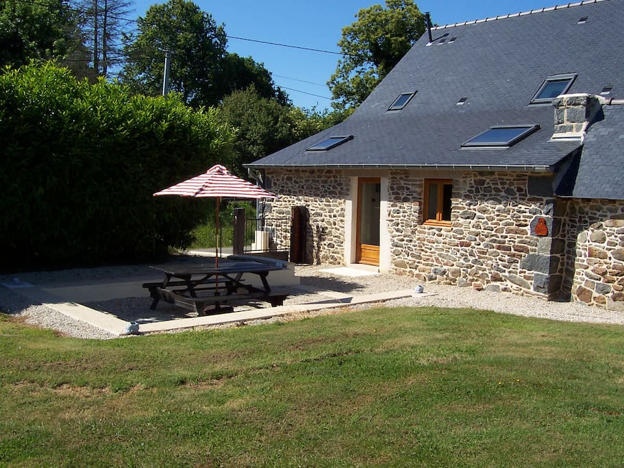 back of house with bread oven and large enclosed garden