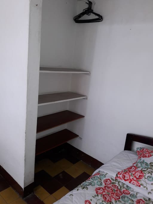 The room has two closets, One per person and it has access to the balcon.