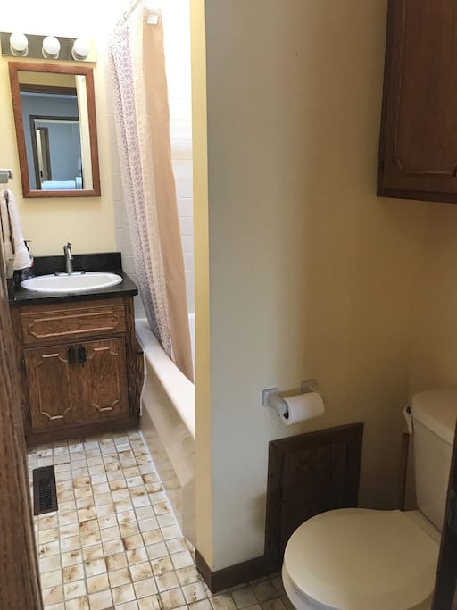 Pocket door to small full bath