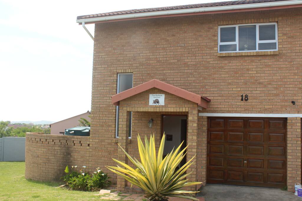 The exterior of our fully-walled home, complete with intruder alarm system