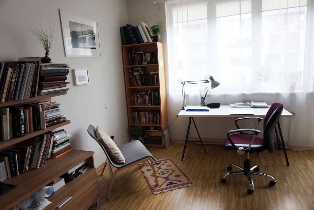A nice place to work on your laptop while your friend is reading a book.