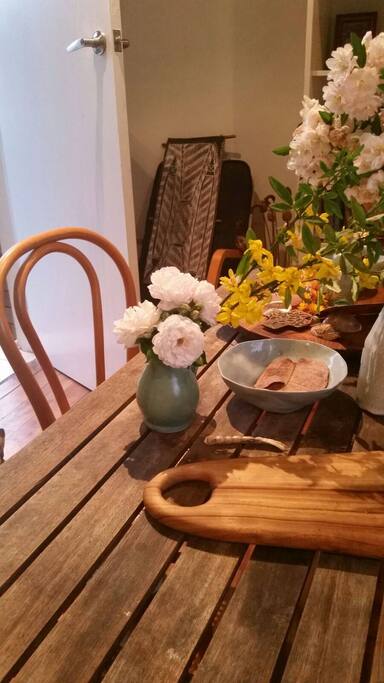 The dining room opens onto a very large backyard and it's lovely to have your morning coffee looking out over the giant oak tree.