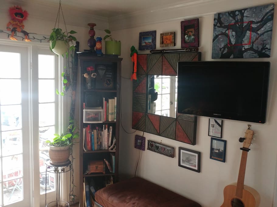 Living room - feel free to use music instruments. The TV is for DVD's only (no cable). There's a RedBox nearby.