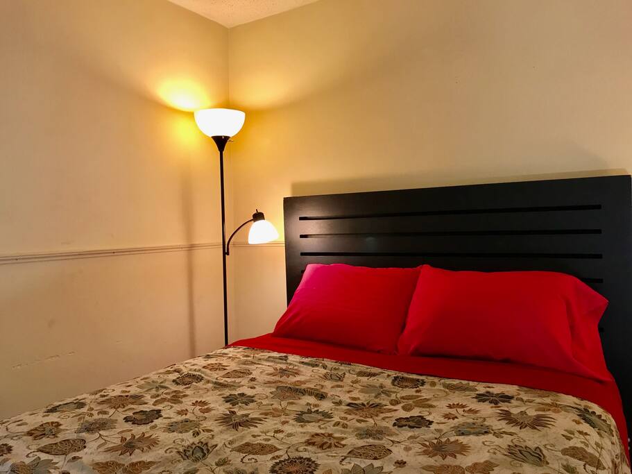 The room has queen size comfortable bed