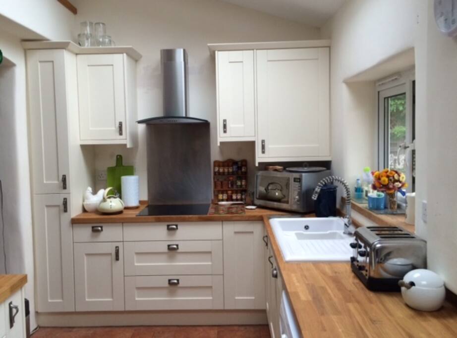 Bright, sunny kitchen with induction hob