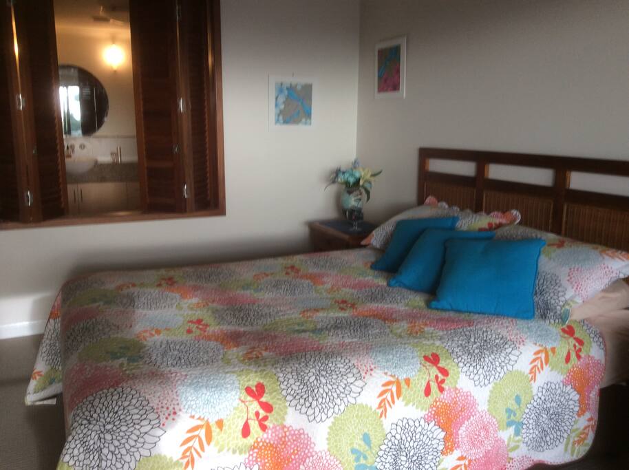 Plenty of space in this bedroom! Walk in wardrobe, large bathroom,Television & lounge chair.