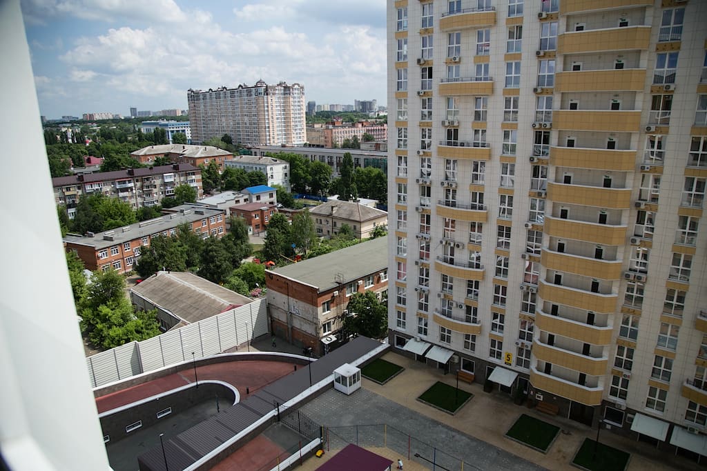 Вид из окна студии. Enjoy the city view from the window of your studio. It also faces a quiet inner courtyard, so you'll never hear the noise of the busy streets.