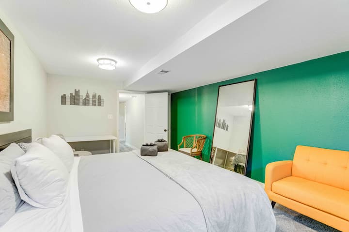 BR 4: Lower level bedroom | King bed, shared bathroom | memory foam mattress, fan, alarm clock, couch, large desk 
