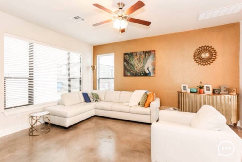 New modern living room with plenty of seating