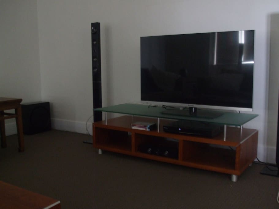 TV with surround sound in comfortable roomy lounge
