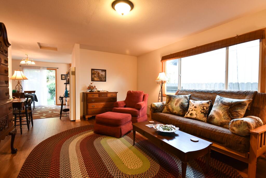 Modern and antique furniture throughout the home.