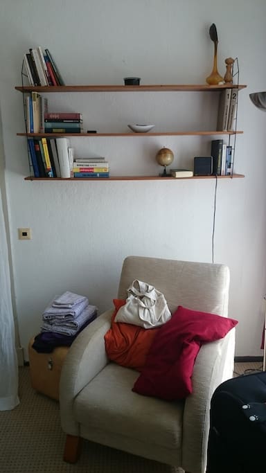 The sofa near windows. It's great to reading here.