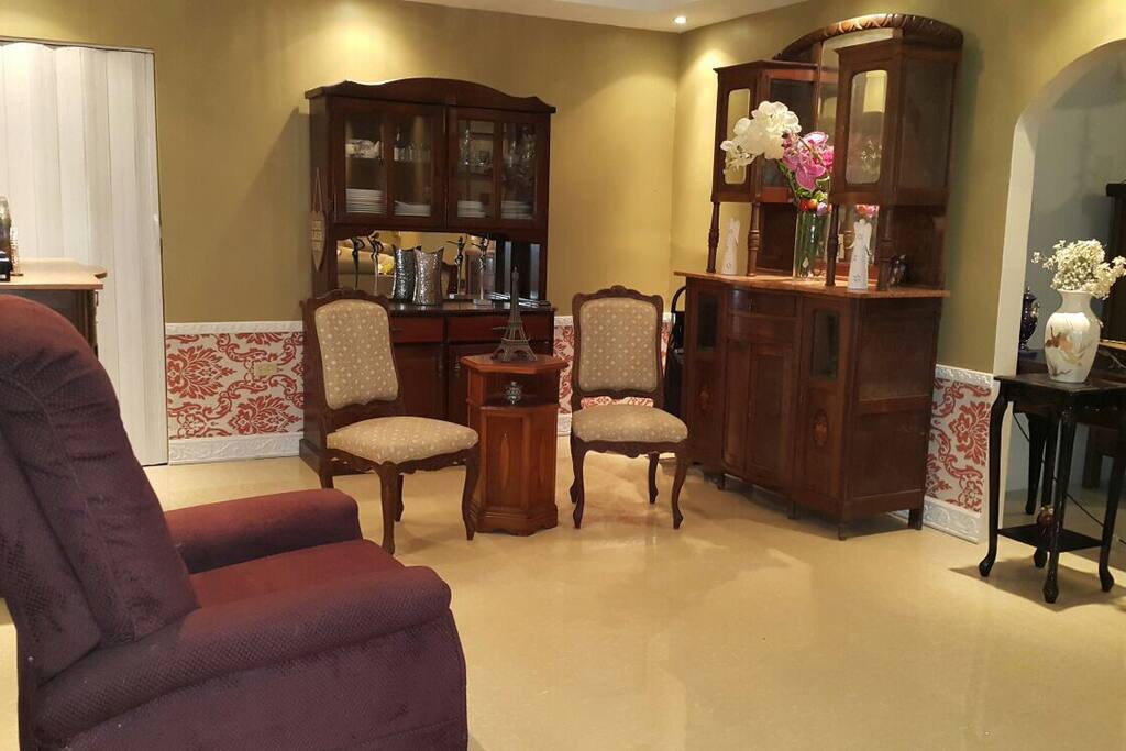 Another seating area. Entrance to second bathroom in view (white door).