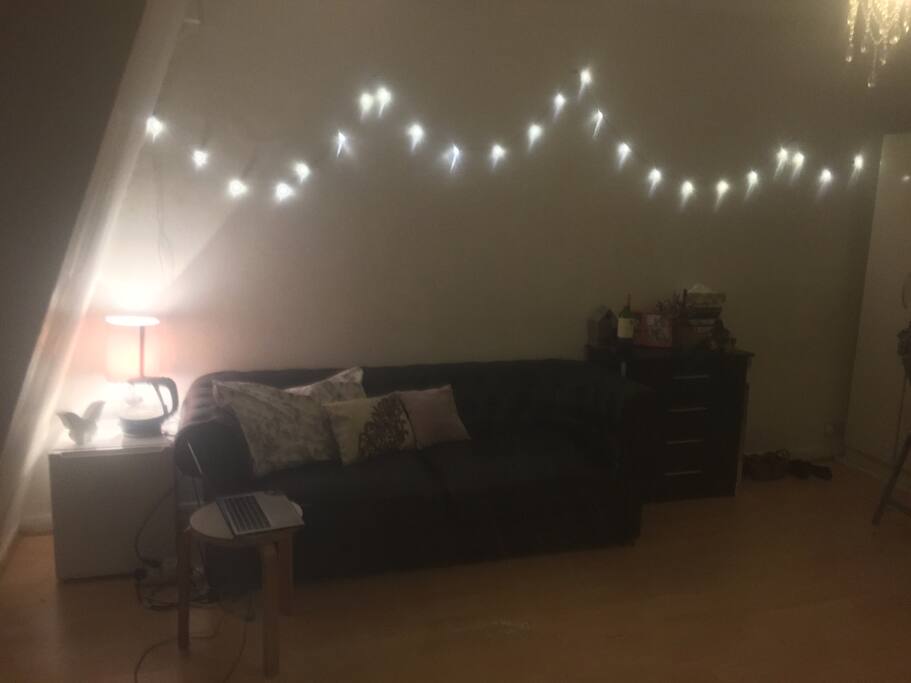 Couch with fridge and kettle
