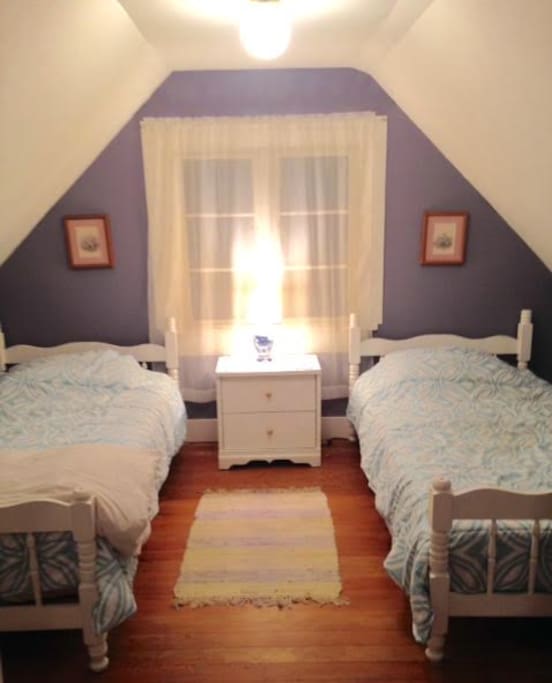 This is the cute upstairs bedroom .