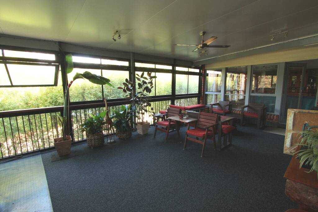 Relax, meditate, read a book, or Watch TV. This is the covered Entertainment Deck area. Stove (not shown) is to the left side of the picture.