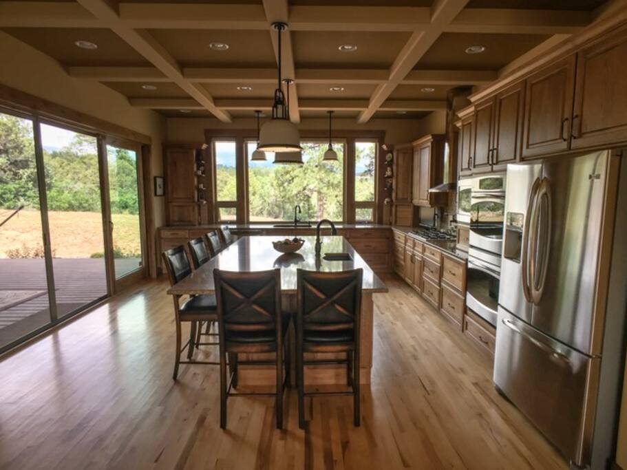 Notice the sliding glass patio doors on the left, bringing the feeling and look of the outdoors into the daily living space